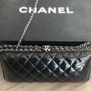 Black patent Chanel clutch
